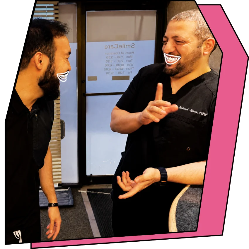 Two dentists sharing a joke together.