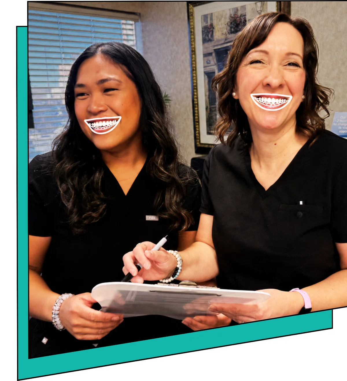 Two hygienists smiling.