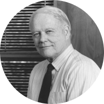 A photo of founder William J. O'Neil in black and white.