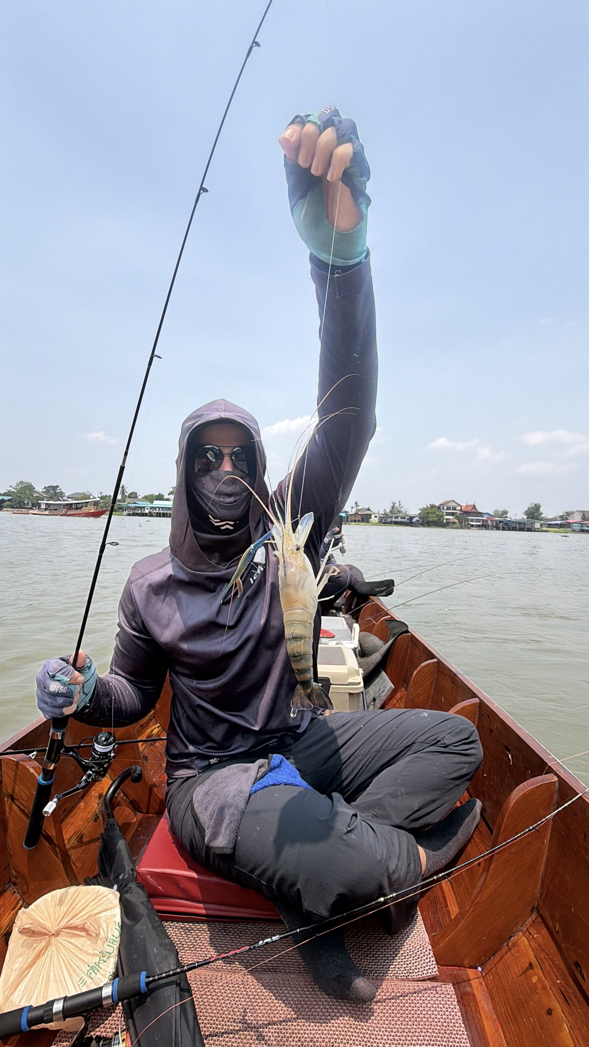 Giant freshwater prawn fishing on the Chao Phraya River near Pathum Thani, Thailand