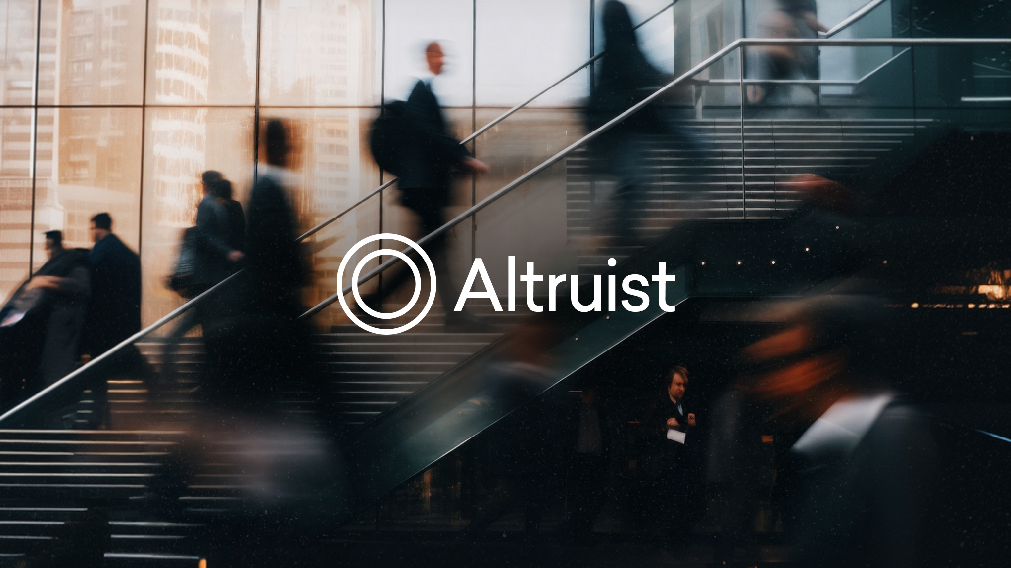 Blurred people walking on stairs and escalator inside a modern building with Altruist logo overlay.