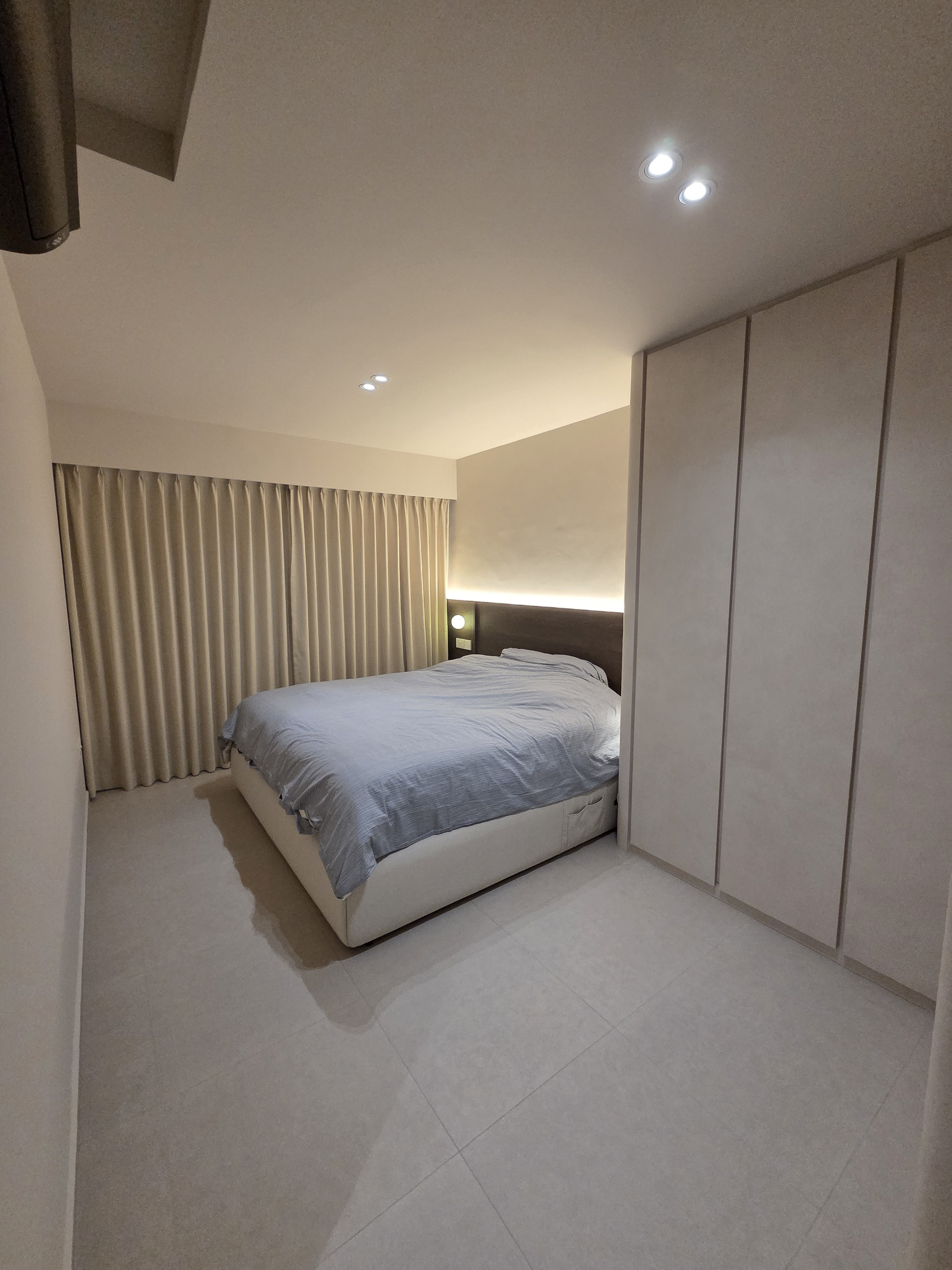 Completed smart lighting project featuring warm ambient lighting in a master bedroom