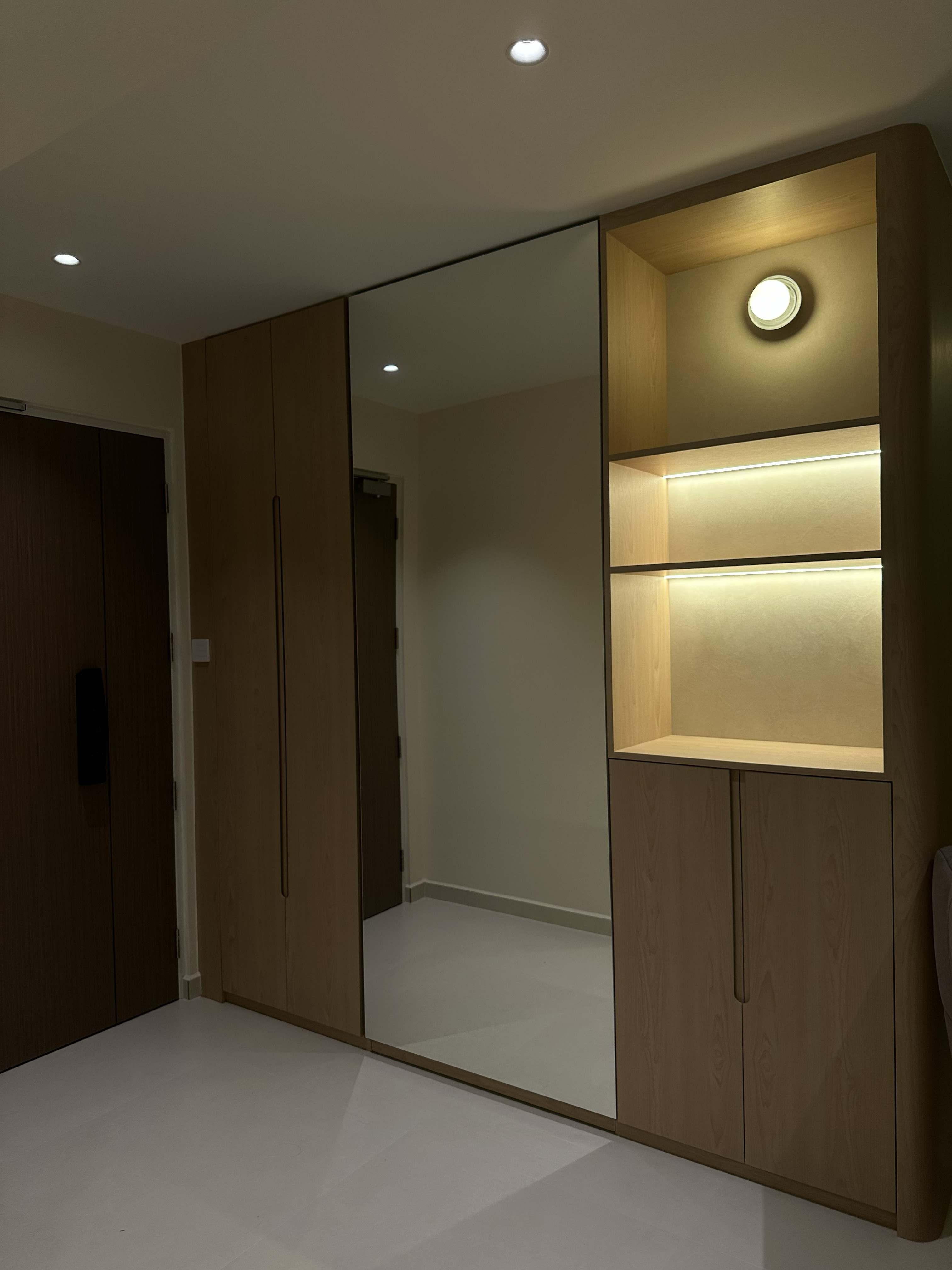 Completed smart home project featuring presence-activated foyer lighting with adjustable brightness and colour temperature for a welcoming entrance