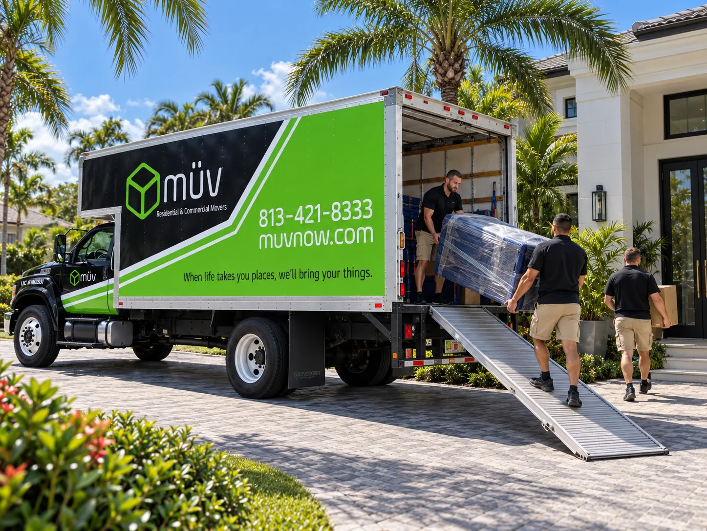 müv moving truck being loaded at a Tampa-area home — call 813-421-8333