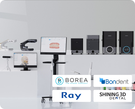 Dental 3D scanners and printers displayed on white pedestals in a bright room with brand logos below.