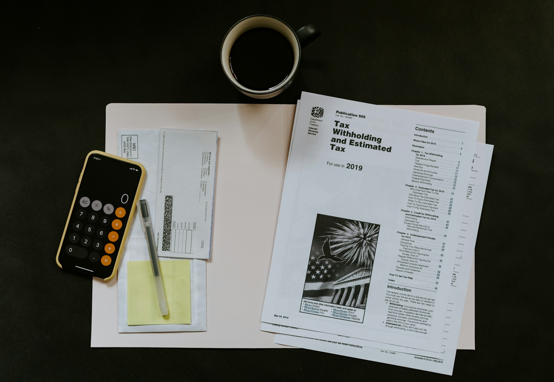 tax papers, coffe and calculator