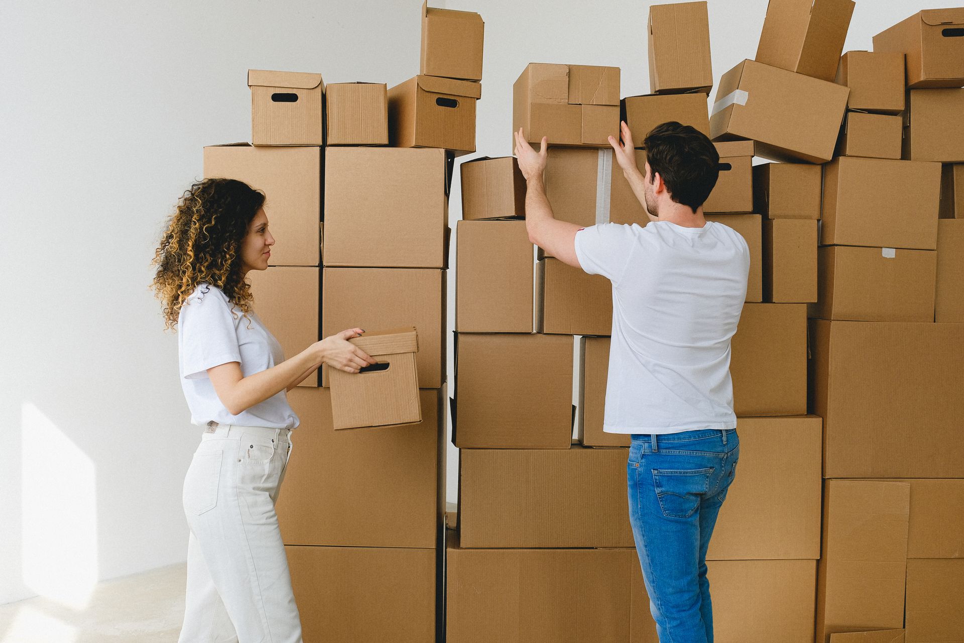 2 peopl and boxes