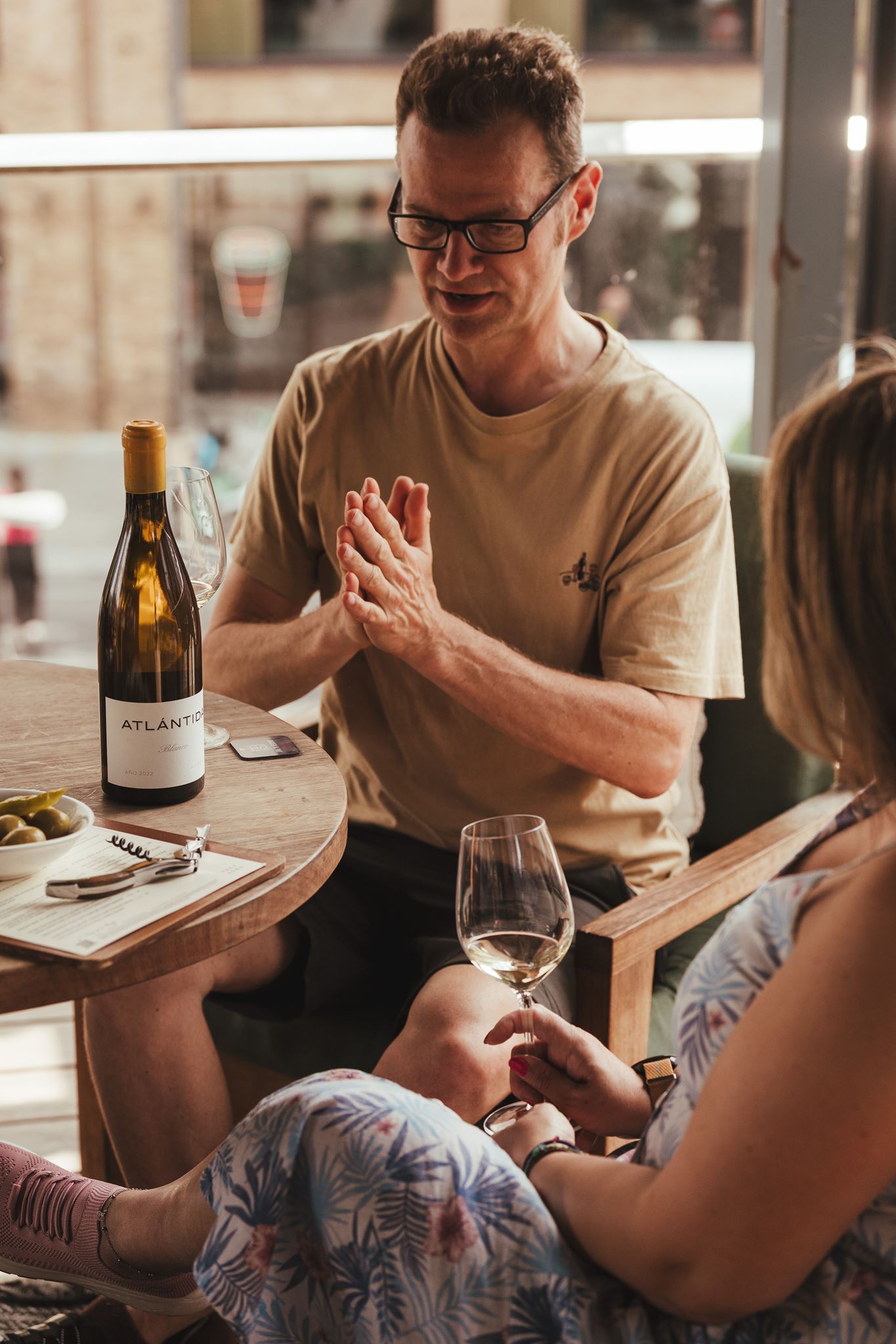Guests choosing wines side-by-side at the machines
