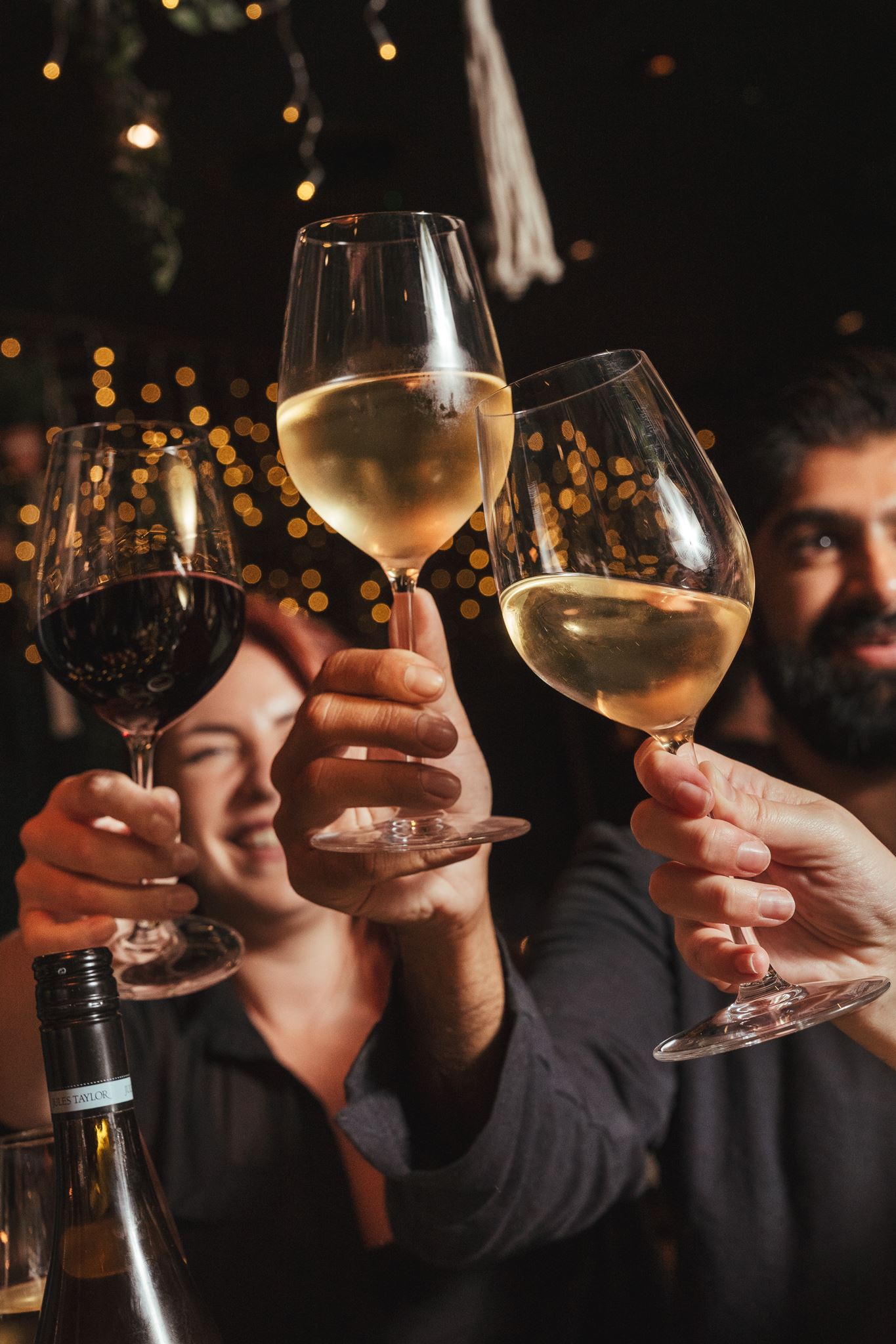 Three wine glasses cheers