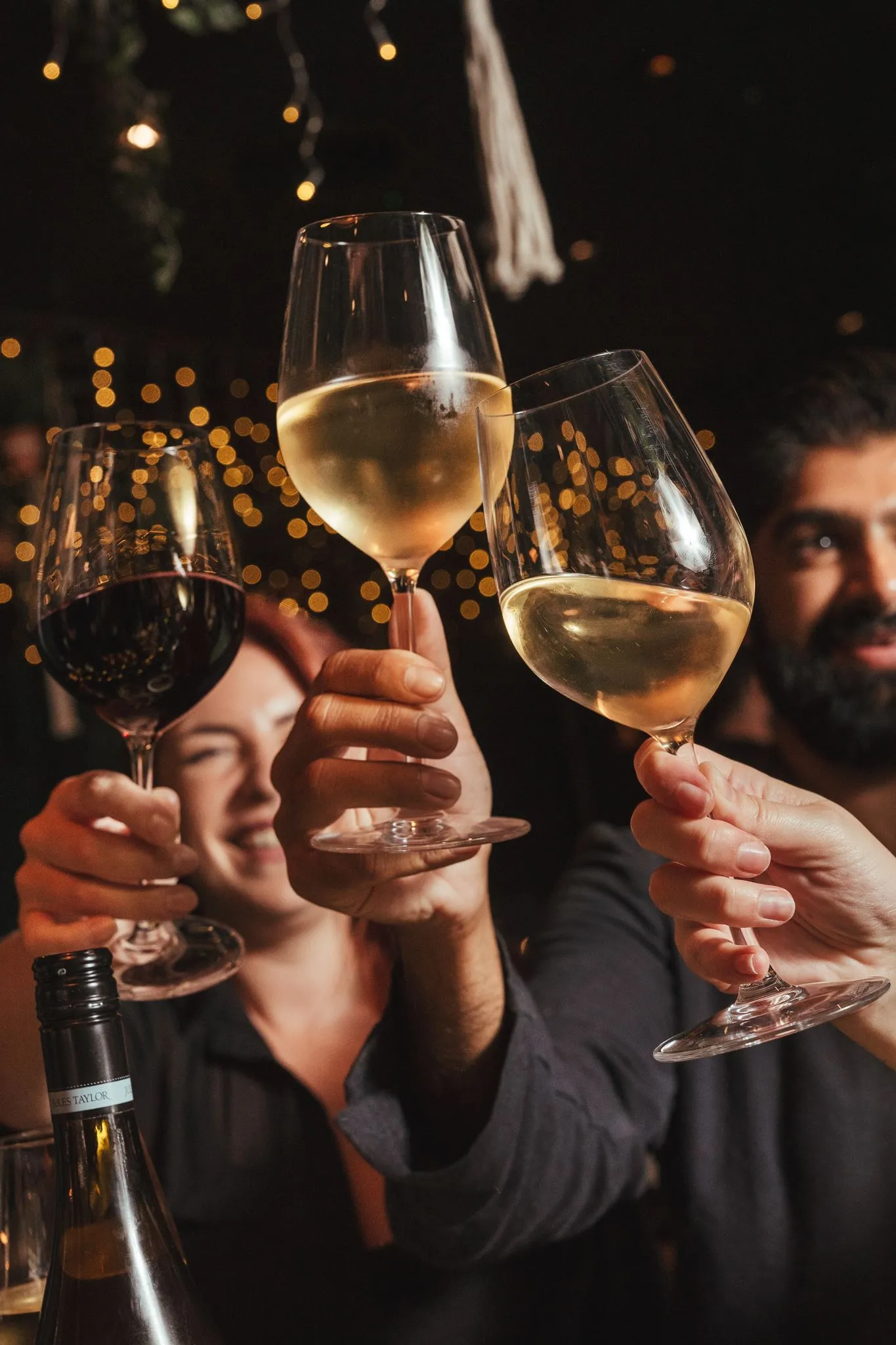Three wine glasses cheers