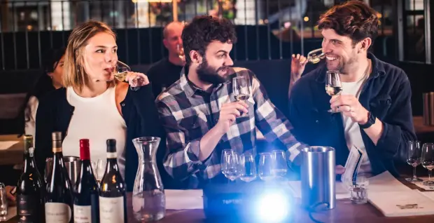 Guests tasting and comparing wines together at a Vagabond wine blending masterclass