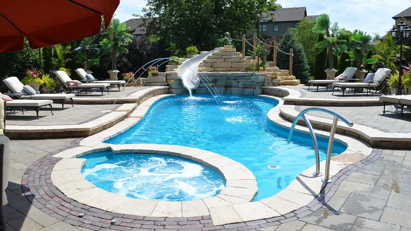 Crystal-clear backyard swimming pool serviced by Sander's Pool Maintenance in Jacksonville, Florida