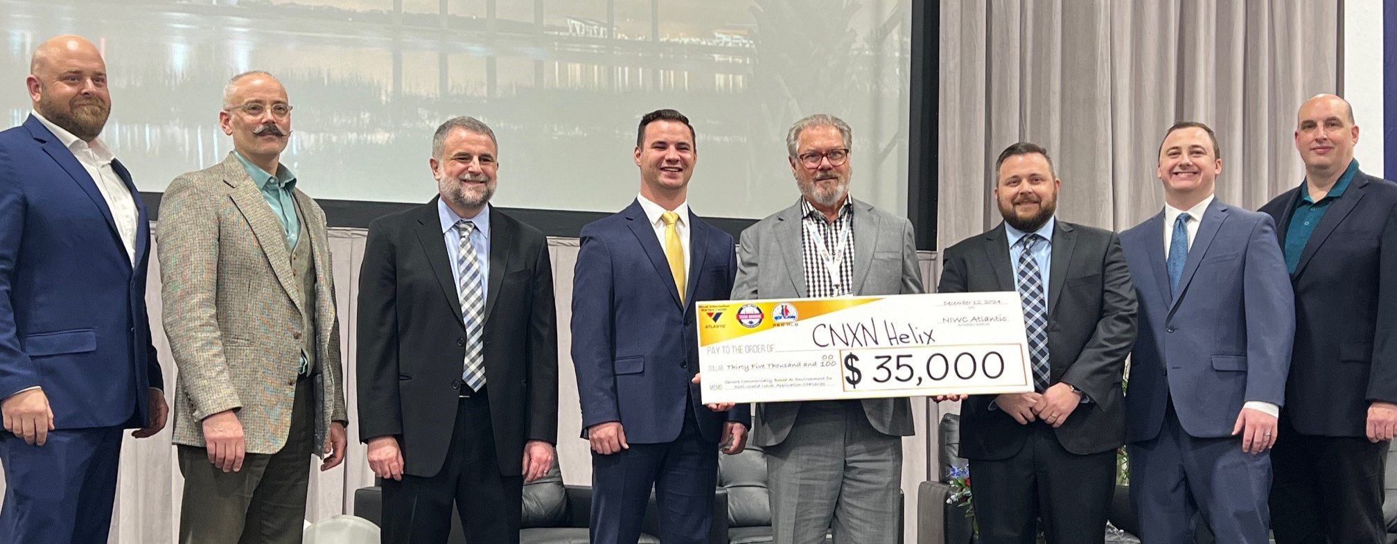 Winning Team with check for $35,000