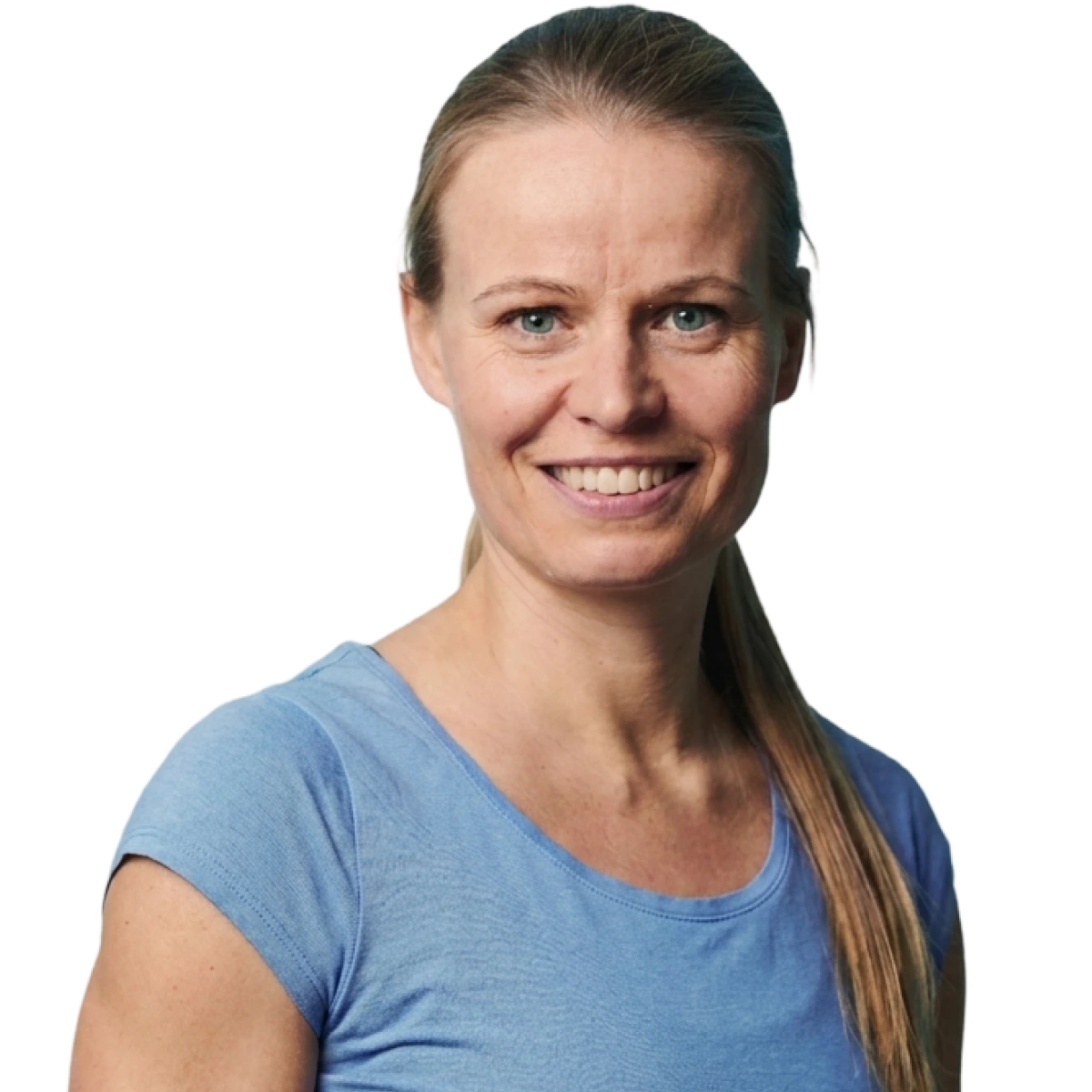 Helle Frederiksen smiling, hair tied back wearing a light blue t-shirt.