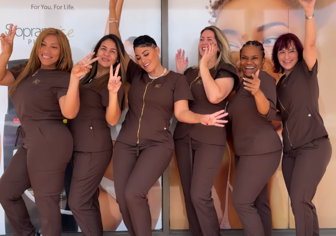 “Medical beauty clinic team in Curaçao posing in uniform”