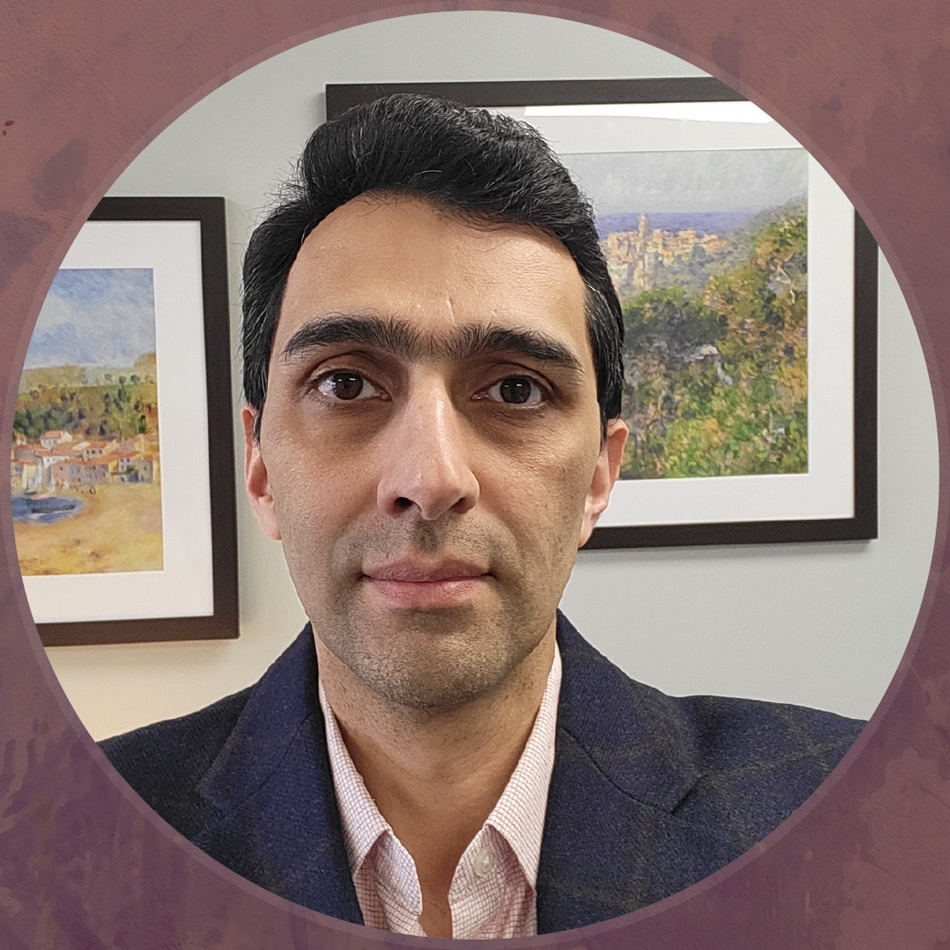 Sam Agdasi wearing blazer in circular framed profile photo