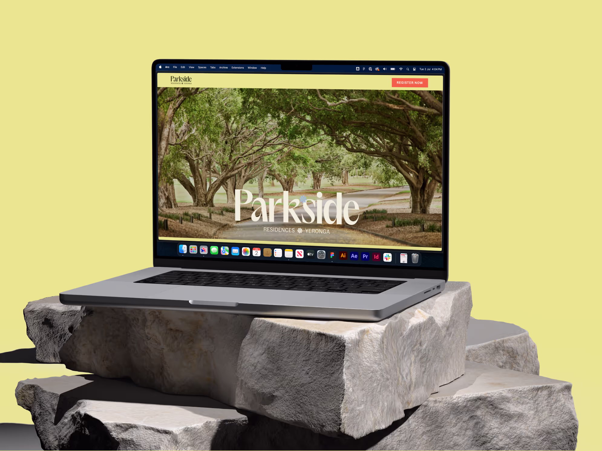 MacBook Pro 16-inch laptop displaying a green park scene with 'Parkside Residences Yeronga' text on screen.