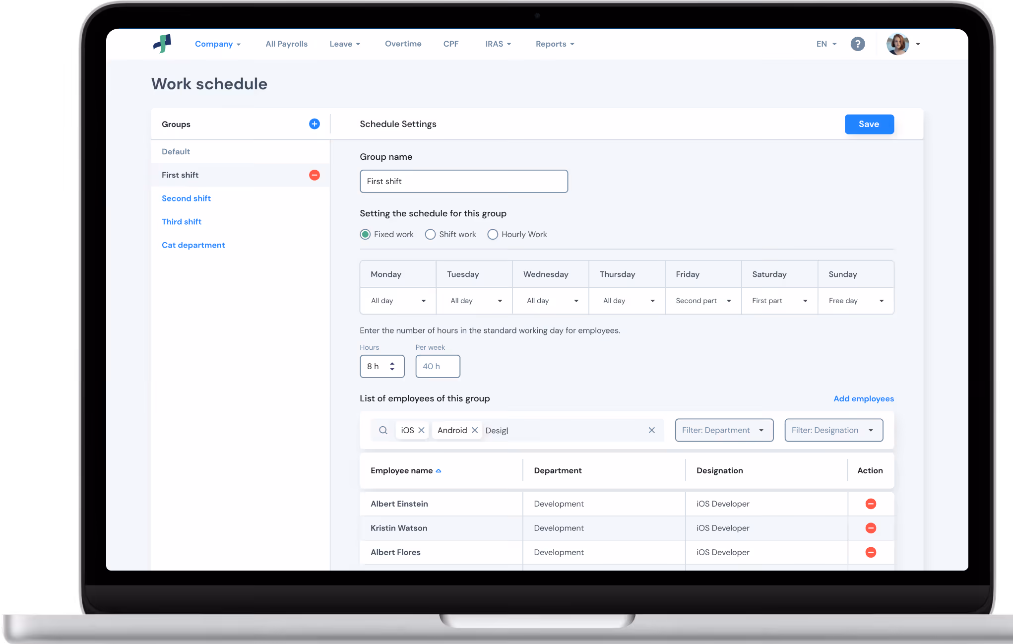 Work schedule management on a laptop: group shifts, daily work settings and employees by department