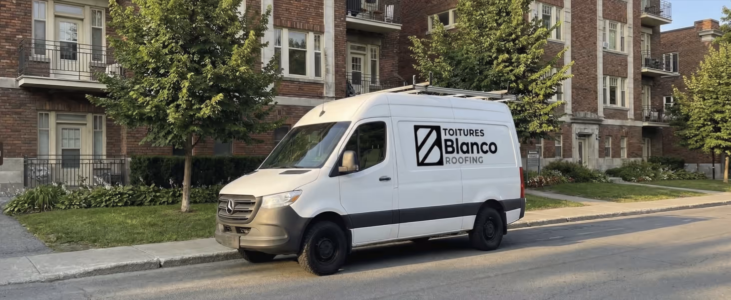 White Mercedes van parked on a residential street with 'Toitures Blanco Roofing' logo on its side.