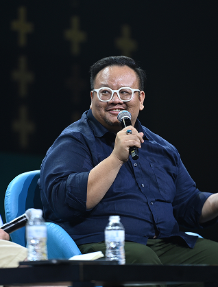 Anthony Leung with microphone