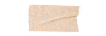 Two pieces of torn beige tape on a transparent background.