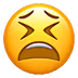 Yellow face with tightly closed eyes and mouth, expressing pain or frustration.