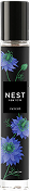 NEST Fragrances room spray bottle with blue floral design labeled "Ocean Mist & Sea Salt."