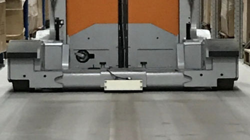 Wire guidance enabling a robot to navigate a warehouse