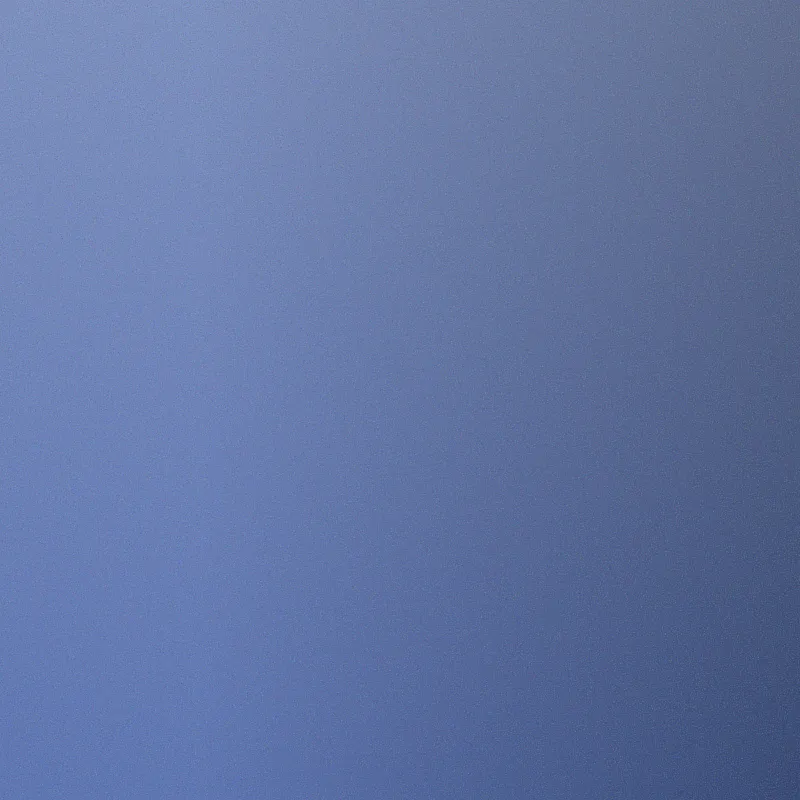 Abstract background with smooth gradient transitioning from light blue on the left to darker blue on the right.