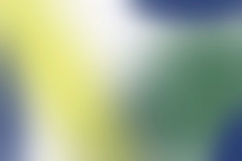 Soft abstract gradient background blending yellow, white, green, and blue colors smoothly.