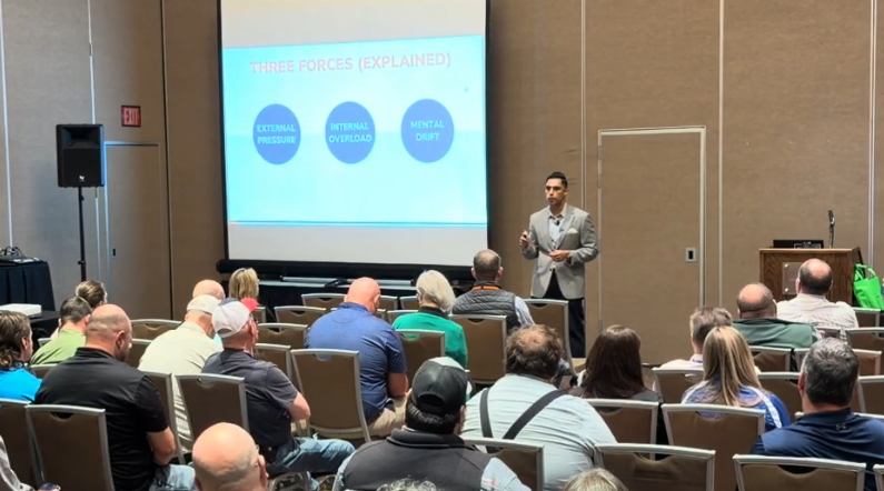 Jaison Thomas presenting to audience