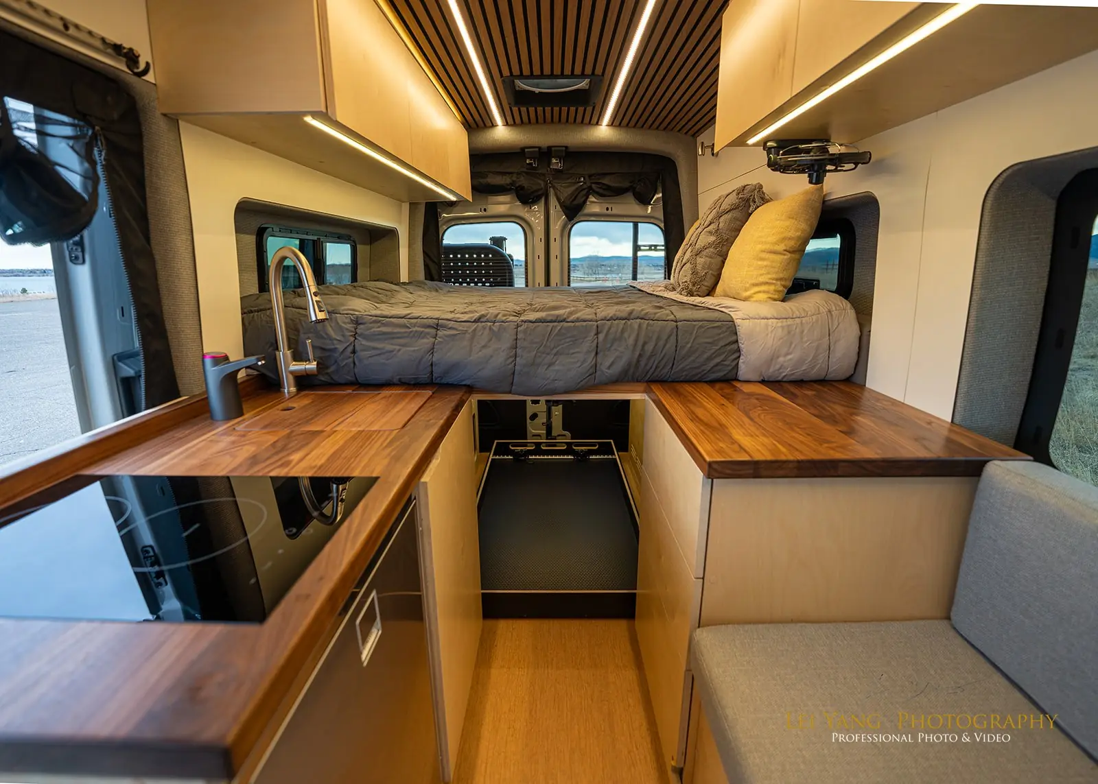 Premium walnut interior with slatted ceiling and integrated lighting