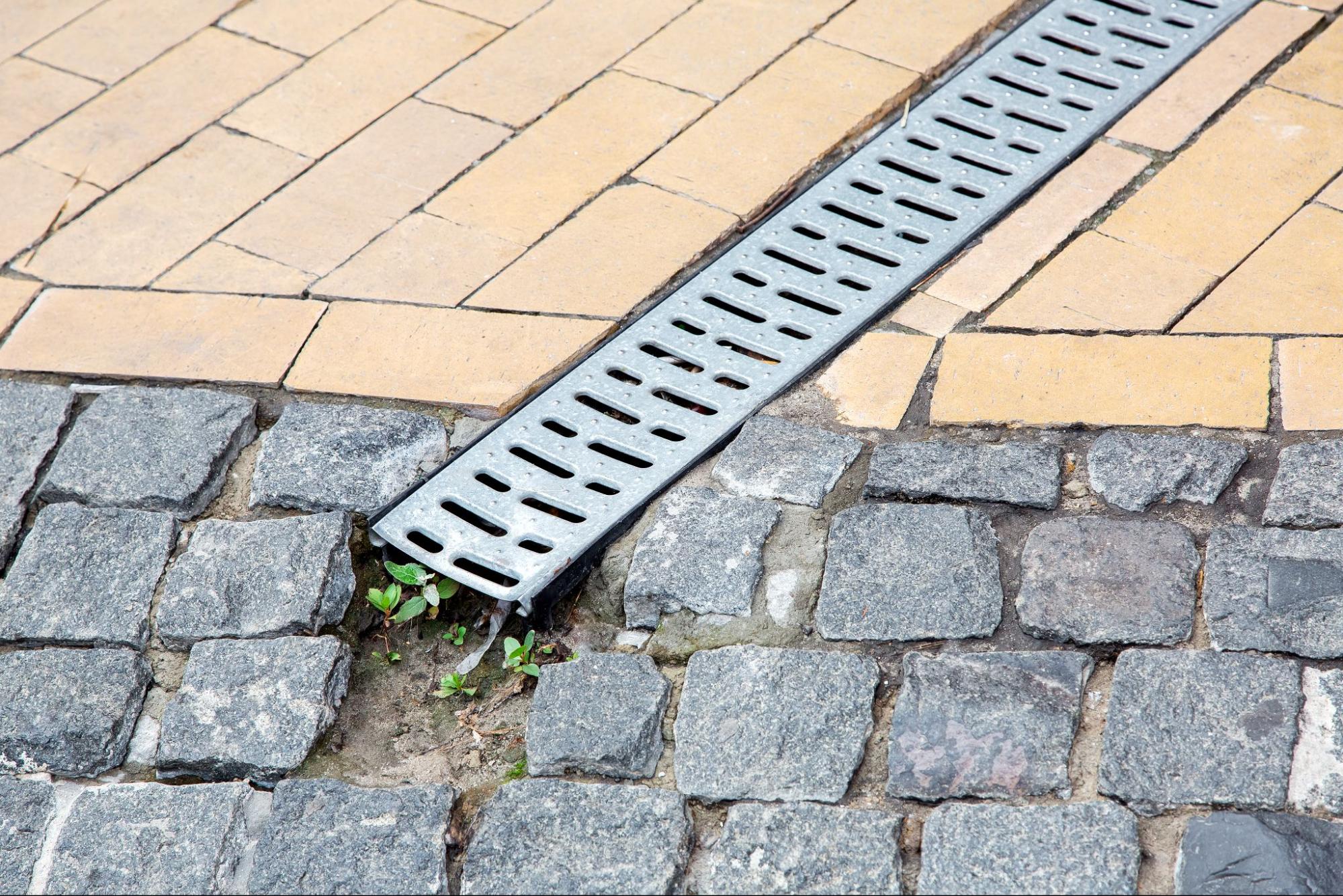 Good drainage is less about adding hardware and more about controlling elevation