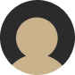 Generic user profile icon with a beige person silhouette on a dark circular background.
