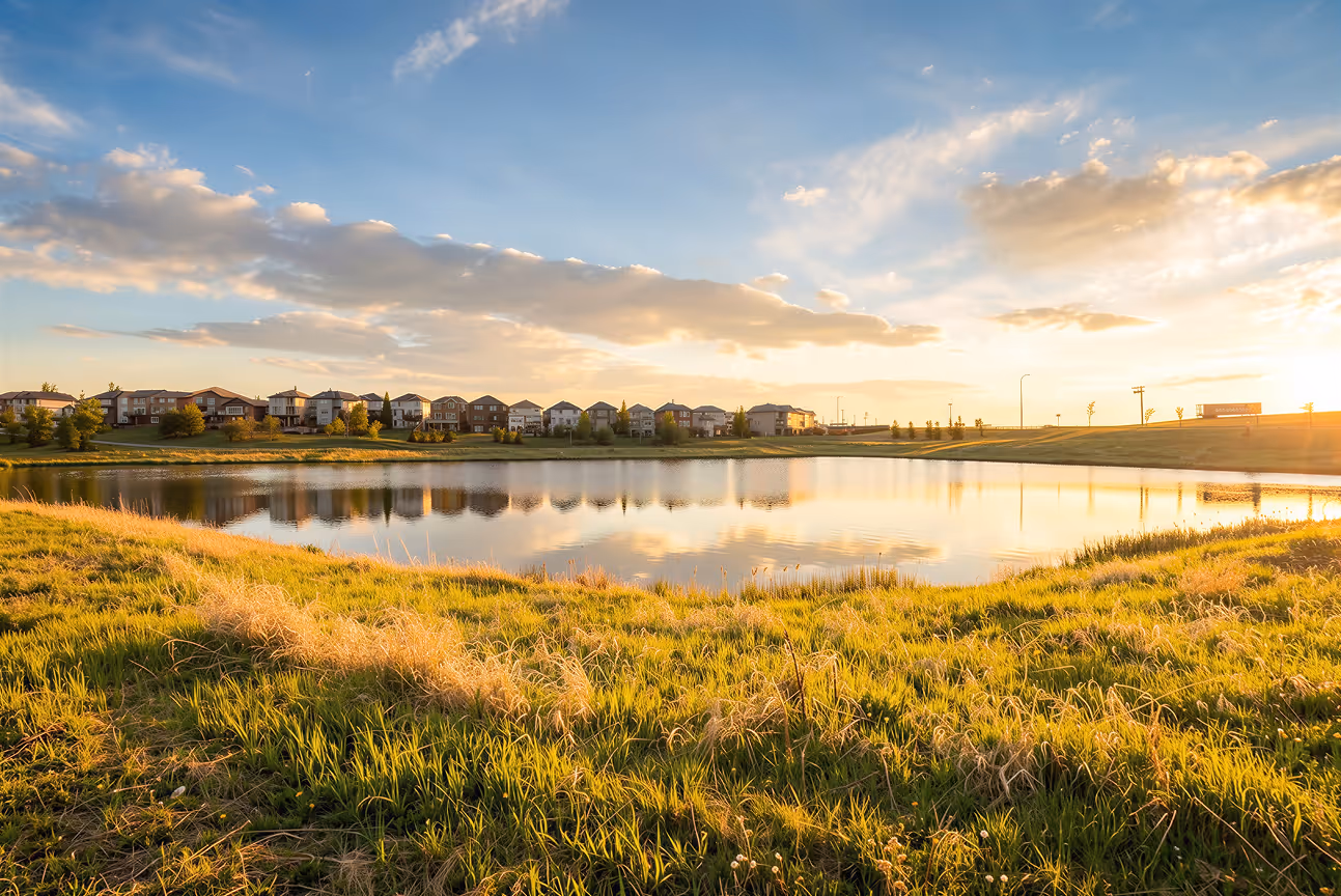 Naturalized pond and walking path in Sage Hill, NW Calgary, near Sage Hill Garden townhomes