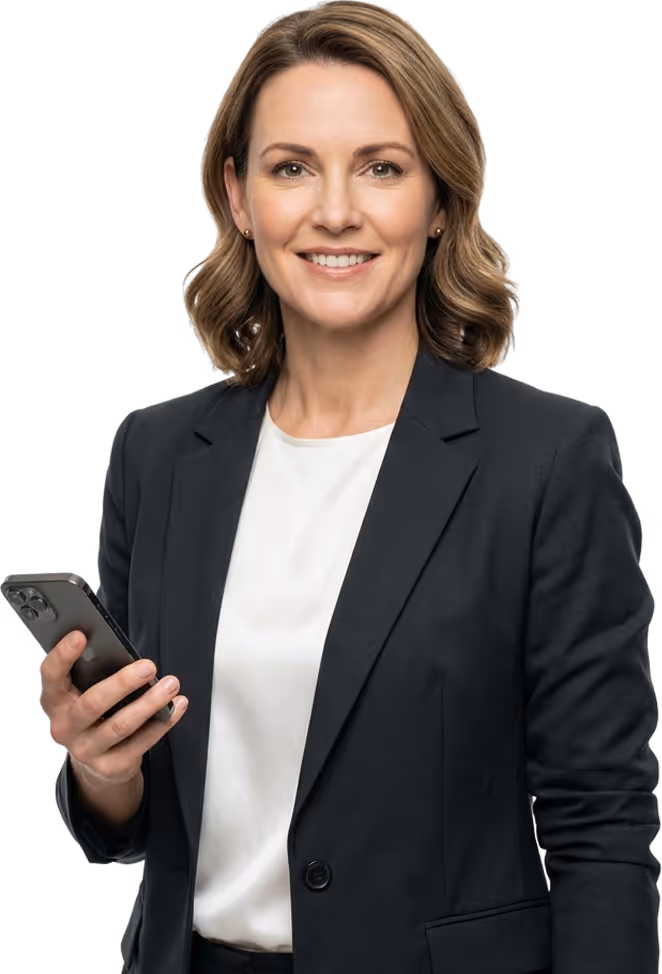 Smiling professional woman in a black blazer holding a smartphone.
