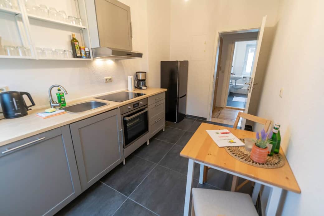 Fully equipped kitchen with dining table