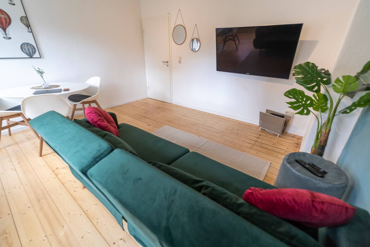 Sofa bed with TV and dining table