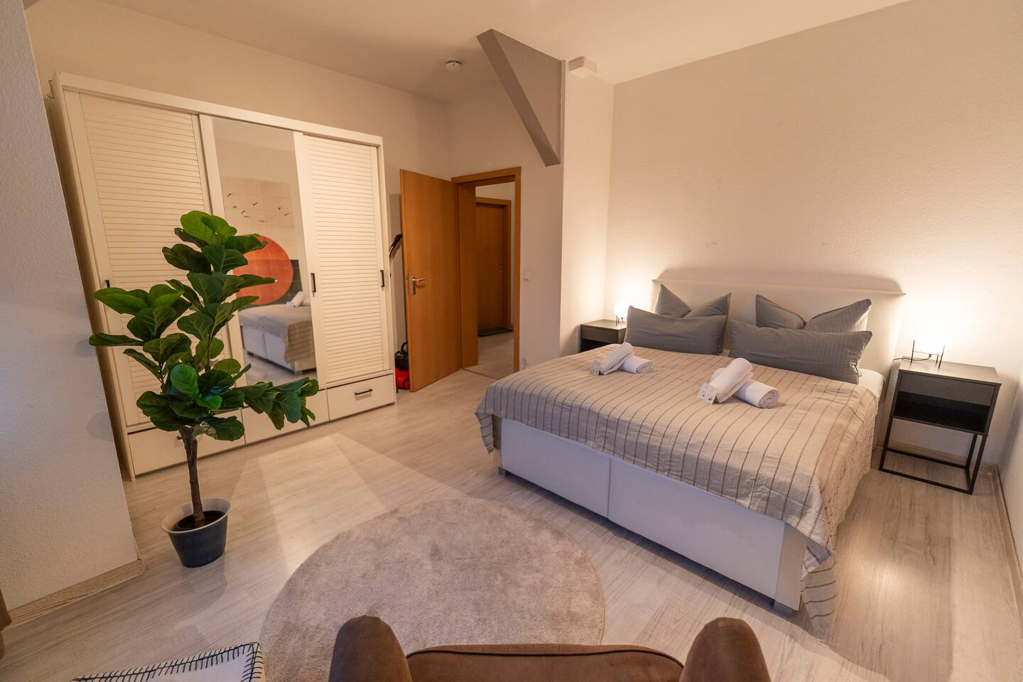 Bright bedroom with wardrobe