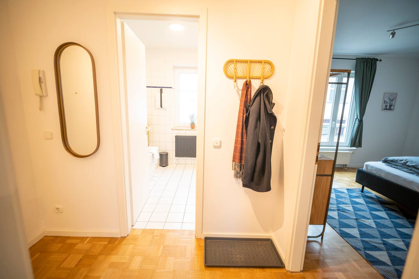 Bright hallway with mirror & wardrobe