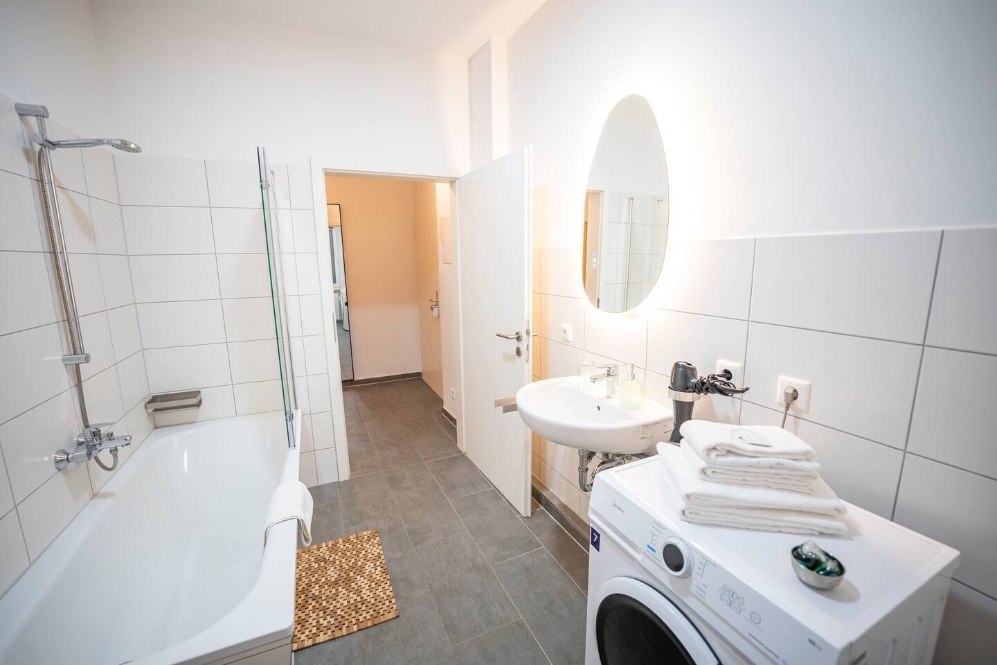 Family bathroom with a washing machine