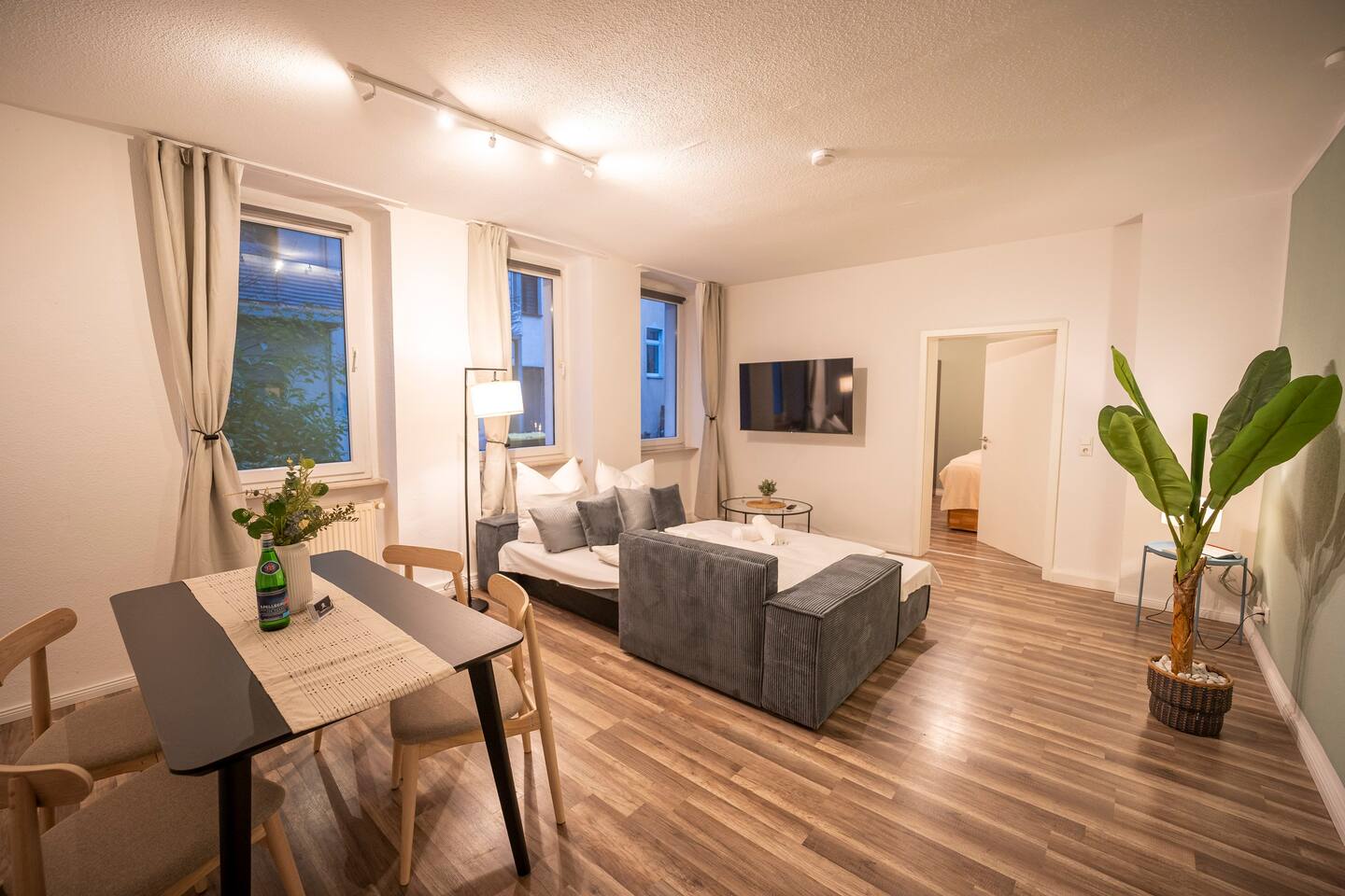 Open living and dining area with lots of daylight