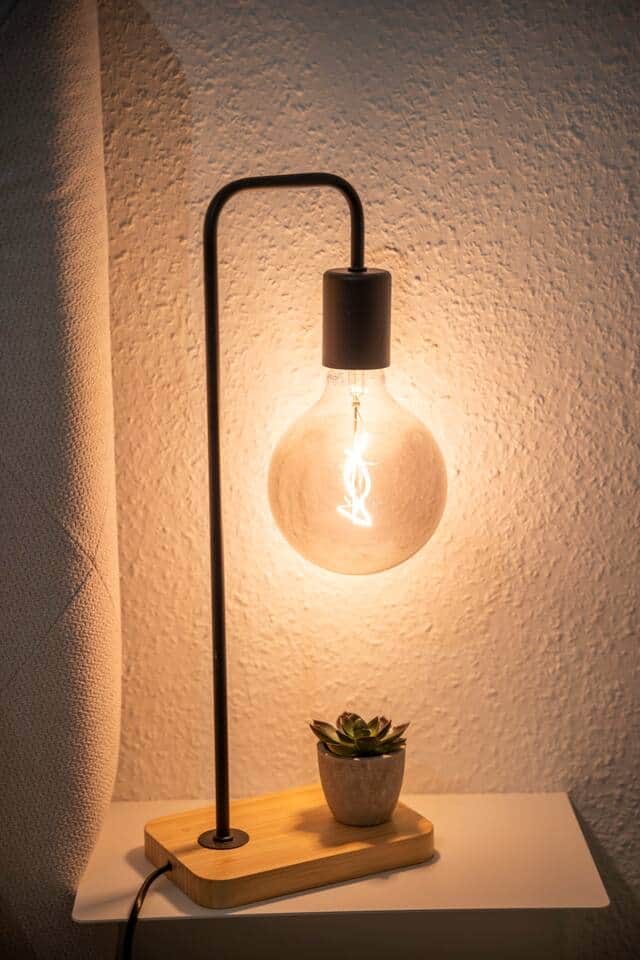 Bedside lamp in the bedroom provides plenty of light