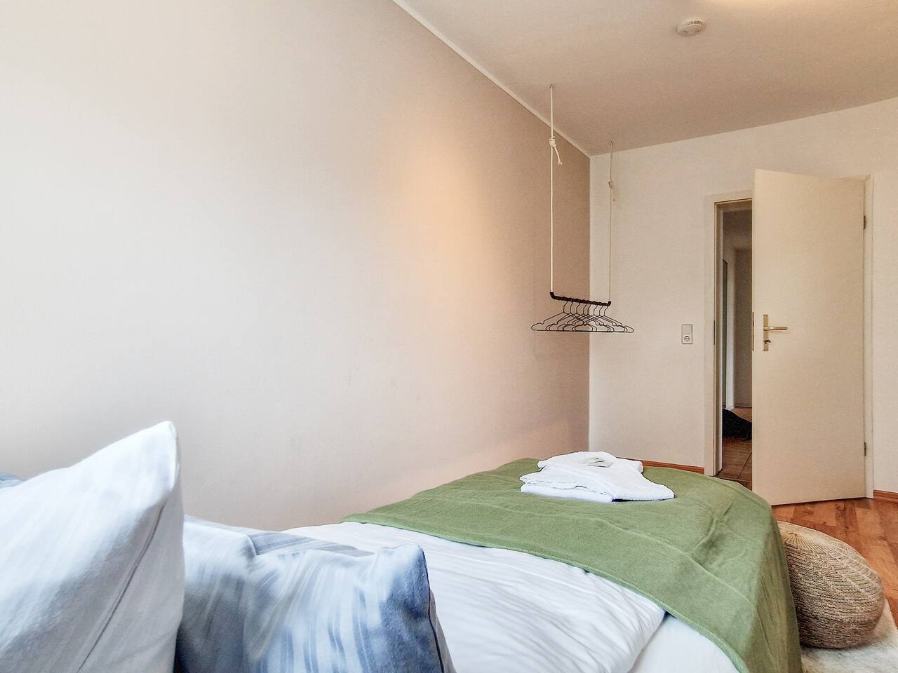 Bedroom with a single bed & a wardrobe