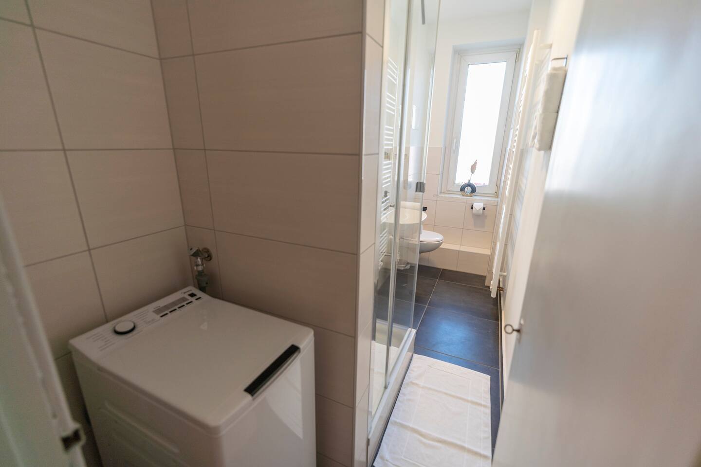 Bathroom with washing machine