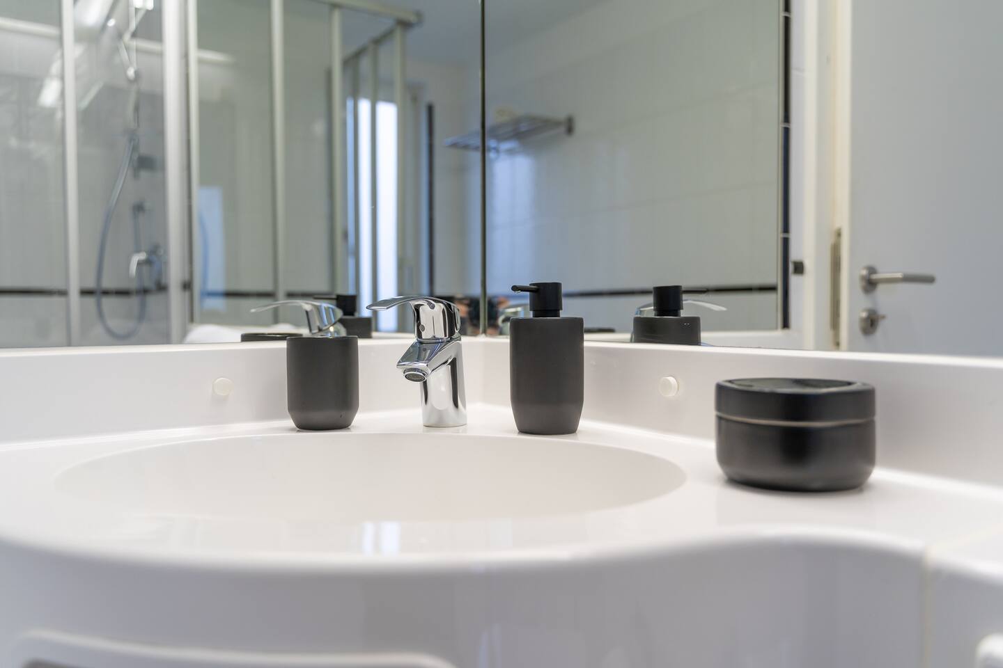 Bathroom with a large mirror