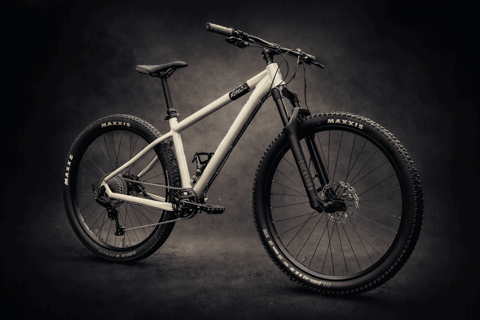 Mountain biker riding a Voodoo Bizango at a UK bike park