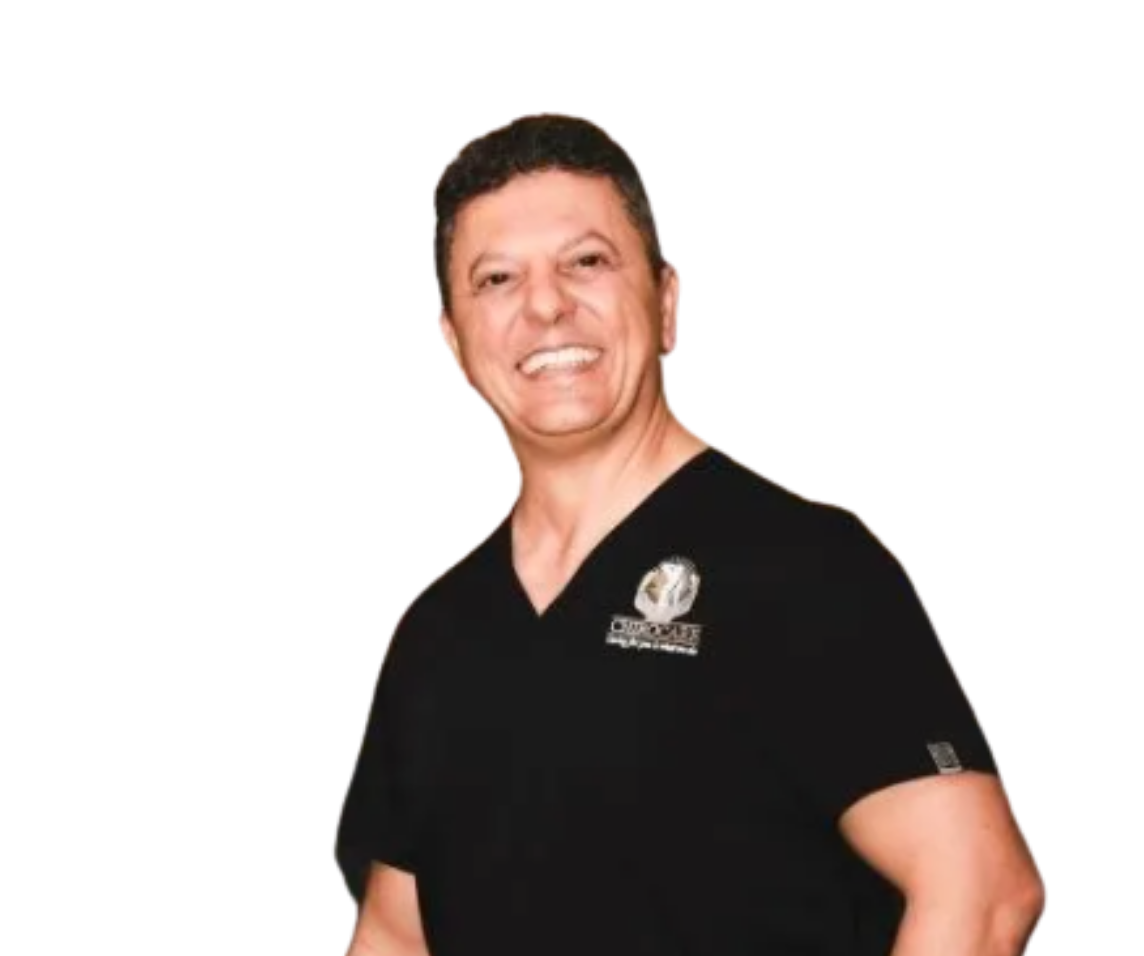 Smiling male doctor wearing a white scrubs