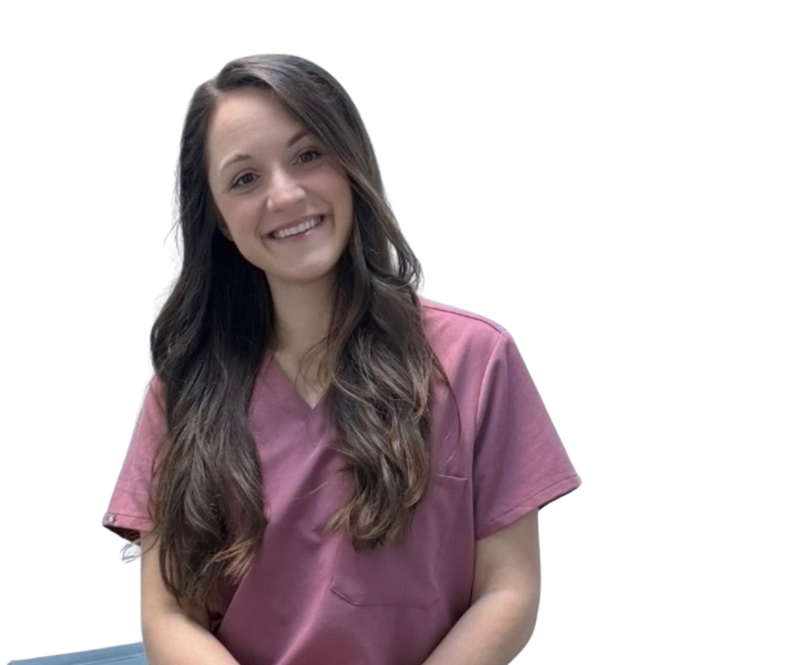 Smiling female doctor in white coat with stethoscope, holding a clipboard and a medicine bottle while wearing blue gloves.