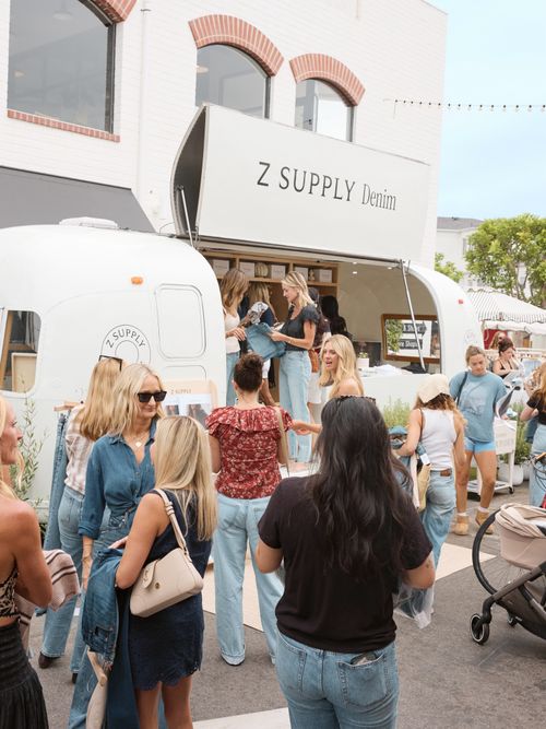Branded Cubana wrapped Airstream trailer at outdoor pop-up event